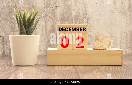 Pot de fleurs et calendrier pour la saison des neiges à partir du 02 décembre. Hiver Banque D'Images