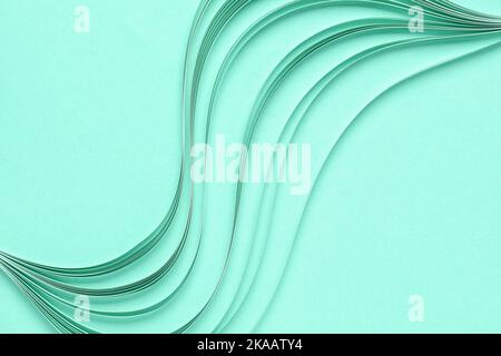 Rayures de papier déchiqueté sur fond de menthe Banque D'Images