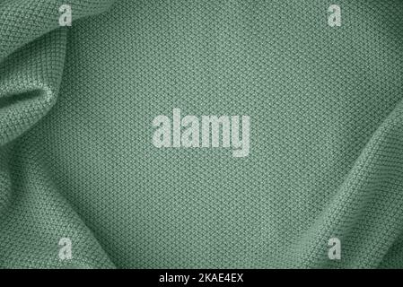 Texture de tissu tricoté dans la couleur turquoise tendance Banque D'Images
