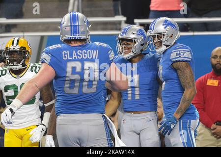 Marvin Jones (11), grand receveur des Lions de Detroit, célèbre son contact avec ses coéquipiers lors de la première partie d'un match de football de la NFL contre les Green Bay Packers à Detroit, Michigan, États-Unis, dimanche, 31 décembre 2017. (Photo de Jorge Lemus/NurPhoto) Banque D'Images