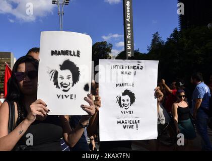 Des manifestants de Sao Paulo, au Brésil, ont fait un acte en fin d'après-midi dimanche 18 mars 2018 en l'honneur de la conseillère de Marielle Franco (PSOL), abattu mercredi soir, 14 mars 2018 dans une voiture dans le centre de Rio de Janeiro. (Photo de Cris Faga/NurPhoto) Banque D'Images