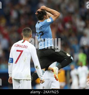 Cristiano RONALDO (R) du Portugal et Martin CACERES de l’Uruguay (22) réagissent après le match du Round 16 de la coupe du monde de la FIFA, Russie, au Fisht Stadium de Sotchi, Russie sur 30 juin 2018. Uruguay gagné par 2-1. (Photo par Raddad Jebarah/NurPhoto) Banque D'Images