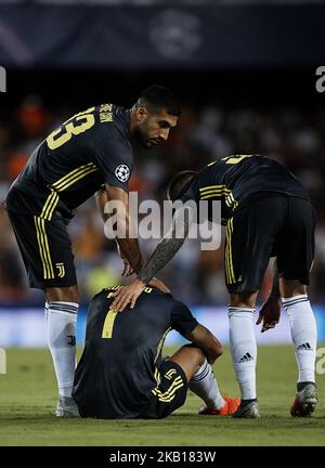 Cristiano Ronaldo (C) de Juventus réagit après avoir pris une carte rouge à côté de ses coéquipiers Federico Bernardeschi (R) et Emre CAN de Juventus lors du match H de la Ligue des champions de l'UEFA entre Valencia CF et Juventus à Mestalla on 19 septembre 2018 à Valence, Espagne (photo de David Aliaga/Nuraga photo) Banque D'Images