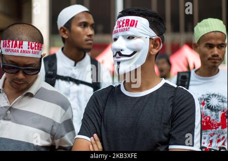 Des milliers de manifestants se rassemblent lors d'un rassemblement organisé par des politiciens musulmans contre la signature de la convention des Nations Unies contre la discrimination, connue sous le nom de CIEDR, sur la place Merdeka à Kuala Lumpur, en Malaisie, sur 8 décembre 2018. (Photo de Chris Jung/NurPhoto) Banque D'Images