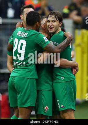 Franck Ribery de Fiorentina fête avec Gaetano Castrovilli, Dalbert et Federico Chiesa de Fiorentina après avoir obtenu des scores lors de la série A match AC Milan / ACF Fiorentina au stade San Siro de Milan, Italie sur 29 septembre 2019 (photo de Matteo Ciambelli/NurPhoto) Banque D'Images