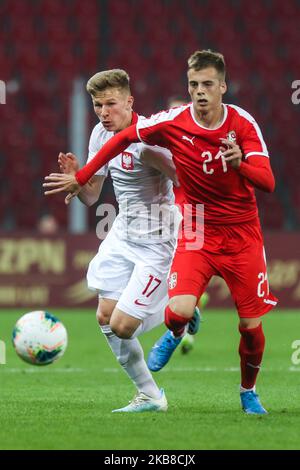 Mateusz Bogusz (POL), Ivan Ilic (SRB) lors du match de qualification de l'UEFA U21 entre la Pologne et la Serbie à Lodz, en Pologne, sur 15 octobre 2019 en 2021. (Photo par Foto Olimpik/NurPhoto) Banque D'Images