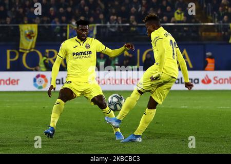 André Frank Zambo Anguissa (L) et Samuel Chukwueze (R) od Villarreal FC lors du match espagnol de la Liga entre Villarreal CF et l'Atlético de Madrid au stade de la Ceramica sur 6 décembre 2019. (Photo de Jose Miguel Fernandez/NurPhoto) Banque D'Images