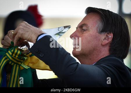 Le président brésilien Jair Bolsonaro assiste aux célébrations de la Journée de la Marine au siège de Marines Corp à Brasilia, sur 13 décembre 2019. (Photo par Andre Borges/NurPhoto) Banque D'Images