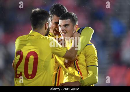 Valentin Mihaila, George Pascanu et Andrei Ciobanu célèbrent lors du match de l'UEFA U21 championnat entre la Roumanie U21 v Finlande U21, à Voluntari, Roumanie, sur 14 novembre 2019. (Photo par Alex Nicodim/NurPhoto) Banque D'Images