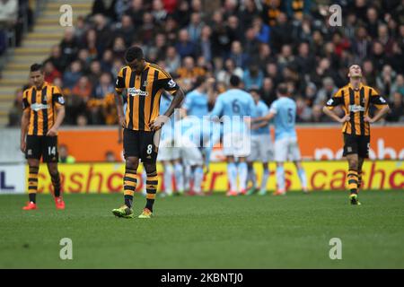 KINGSTON UPON HULL, ANGLETERRE -Jake Livermore (l), Tom Huddlestone (c) et Robert Chester (r) réagissent après le deuxième but de Manchester City lors du match de la première ligue entre Hull City et Manchester City au KC Stadium, Kingston upon Hull, le samedi 15th mars 2014 (photo de Mark Fletcher/MI News/NurPhoto) Banque D'Images