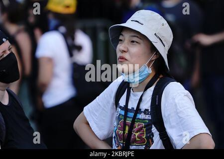 Les manifestants campent près de l'hôtel de ville de New York alors que Manhattan entre dans la phase 2 de réouverture suite aux restrictions imposées pour enrayer la pandémie du coronavirus à 24 juin 2020, dans la ville de New York. La phase 2 permet la réouverture de bureaux, de magasins de détail, de restaurants en plein air, de barbiers et de salons de beauté et de nombreuses autres entreprises. La phase 2 est la deuxième des quatre étapes désignées par l'État. (Photo de John Nacion/NurPhoto) Banque D'Images