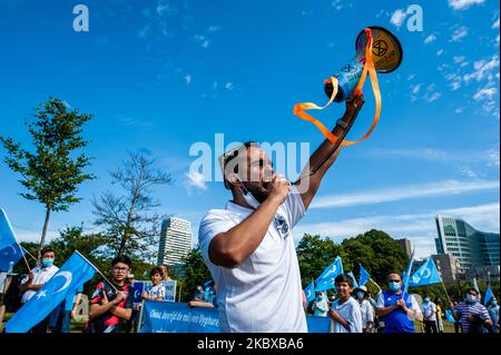 Un homme ouïghour crie des slogans contre la Chine, lors de la manifestation "liberté pour les ouïghours" à la Haye, pays-Bas, sur 20 août 2020. (Photo par Romy Arroyo Fernandez/NurPhoto) Banque D'Images