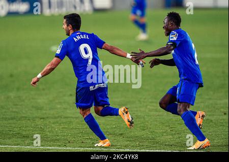 Angel Rodriguez et Djene célèbrent un but lors du match de la Ligue SmartBank entre Getafe CF et le Club athlétique au Colisée Alfonso Perez sur 29 novembre 2020 à Getafe, Espagne. (Photo de Rubén de la Fuente Pérez/NurPhoto) Banque D'Images