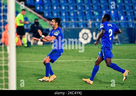 Angel Rodriguez et Djene célèbrent un but lors du match de la Ligue SmartBank entre Getafe CF et le Club athlétique au Colisée Alfonso Perez sur 29 novembre 2020 à Getafe, Espagne. (Photo de Rubén de la Fuente Pérez/NurPhoto) Banque D'Images