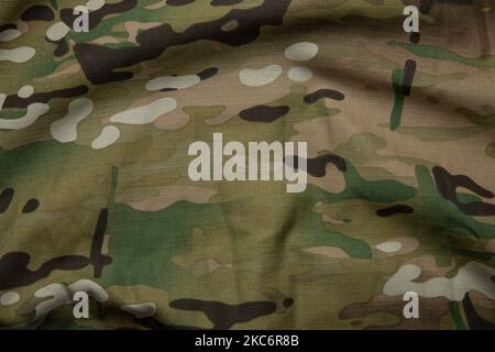 Toile de fond de la texture du tissu camouflage multiple de force armée. Banque D'Images
