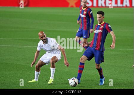 Sergio Busquets et Mikel Rico lors du match entre le FC Barcelone et SD Huesca, correspondant à la semaine 27 de la Liga Santander, joué au Camp Nou Stadium, le 15th mars 2021, à Barcelone, Espagne. -- (photo par Urbanandsport/NurPhoto) Banque D'Images