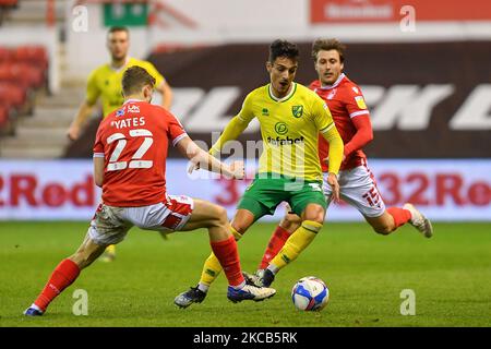 Dimitris Giannoulis de la ville de Norwich en bataille avec Ryan Yates (22) de la forêt de Nottingham lors du match de championnat Sky Bet entre la forêt de Nottingham et la ville de Norwich au City Ground, Nottingham, le mercredi 17th mars 2021. (Photo de Jon Hobley/MI News/NurPhoto) Banque D'Images