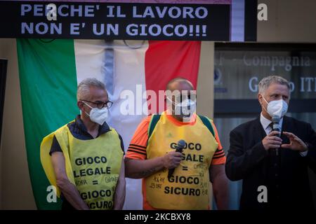 Protestation sur la place Montecitorio, Rome, Italie, sur 31 mars 2021 par le secteur public des jeux d'argent et les travailleurs et les entrepreneurs dans le secteur qui, au cours de la dernière année, n'ont été ouverts que dans les mois d'été, ce qui met des milliers de travailleurs dans le secteur en danger et demande au gouvernement de rouvrir les activités des salles de jeux. (Photo par Andrea Ronchini/NurPhoto) Banque D'Images