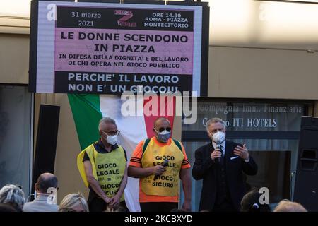 Protestation sur la place Montecitorio, Rome, Italie, sur 31 mars 2021 par le secteur public des jeux d'argent et les travailleurs et les entrepreneurs dans le secteur qui, au cours de la dernière année, n'ont été ouverts que dans les mois d'été, ce qui met des milliers de travailleurs dans le secteur en danger et demande au gouvernement de rouvrir les activités des salles de jeux. (Photo par Andrea Ronchini/NurPhoto) Banque D'Images