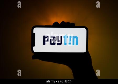 Le logo Paytm est affiché sur l'écran d'un téléphone dans cette photo prise à Cracovie, en Pologne, sur 14 juillet 2021 (photo de Jakub Porzycki/NurPhoto) Banque D'Images