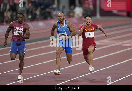 Lamont Marcell Jacobs et Bingtian su pendant 100 mètres pour les hommes aux Jeux Olympiques de Tokyo, au stade olympique de Tokyo, Tokyo, Japon sur 1 août 2021. (Photo par Ulrik Pedersen/NurPhoto) Banque D'Images