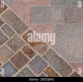 Texture du sol porphyre. Détails architecturaux, gros plan. Le détail de porphyre Trentin est utile comme arrière-plan. Trentin-Haut-Adige, nord de l'Italie Banque D'Images
