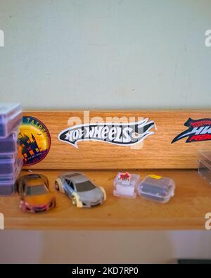 Perak, Malaisie - 12 août 2022 : logo des jouets HotWheels sur l'étagère. HotWheels est un produit de Mattel. Banque D'Images