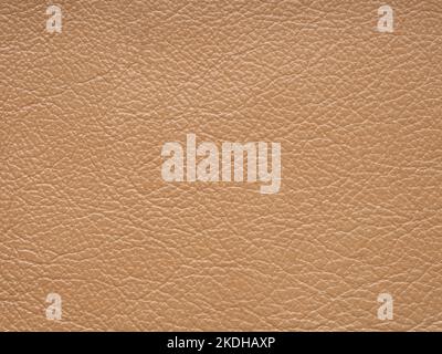 Cuir orange foncé, brun peau naturelle avec motif lignes design ou arrière-plan rouge abstrait. Peut utiliser un fond d'écran ou un événement de luxe en toile de fond Banque D'Images
