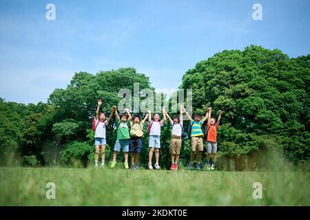 Enfants japonais au parc de la ville Banque D'Images