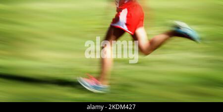 L'exécution de course cross-country sports concours flou de vitesse Banque D'Images