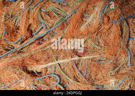 Filets de pêche gros plan abstrait. Filets de pêche en nylon sur un bateau. Photo de haute qualité Banque D'Images