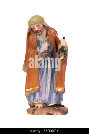 Figure en céramique représentant Joseph. Figurine homme en céramique isolée sur fond blanc Banque D'Images