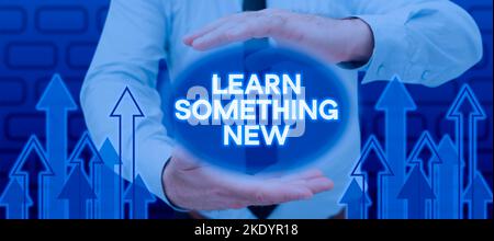 Écriture affichage de texte apprendre quelque chose de nouveau, mot pour être enseigné nouveau sujet activité connaissance ou sport Banque D'Images