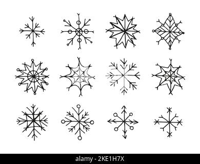 Ensemble de flocons de neige noirs à encre dessinés à la main isolés sur fond blanc. Illustration de Vecteur
