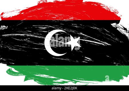 Un pinceau à motif d'affligé peint le drapeau libyen sur fond blanc Banque D'Images