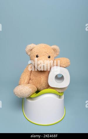 Ours en peluche sur un pot. Banque D'Images