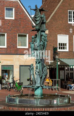 Deutschland, Stadtlohn, Westmuensterland, Muensterland, Westfalen, Nordrhein-Westfalen, NRW, Figurenbrunnen auf dem Marktplatz *** Légende locale *** Banque D'Images