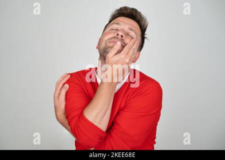 Je suis fatigué de tout. Homme ennuyé. Un concept ennuyeux, ennuyeux et fastidieux. Banque D'Images