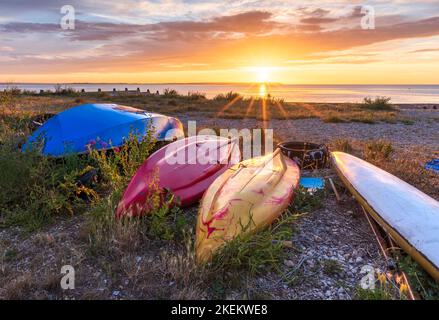 Coucher de soleil sur la côte nord du Kent à Whitstable Banque D'Images