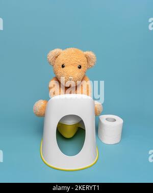 Ours en peluche sur un pot. Banque D'Images