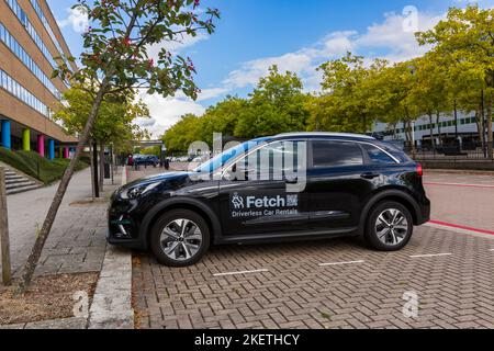 FETCH Driverless car Rentals car, voiture électrique noire Kia, garée à Milton Keynes, Buckinghamshire, Royaume-Uni en septembre Banque D'Images