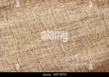 Arrière-plan en toile de jute texturé non coloré naturel. Toile de sac Hessian texture tissée Banque D'Images