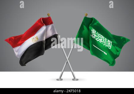 Deux drapeaux croisés de Wavy de l'Égypte et du Royaume d'Arabie Saoudite, signe des relations égyptiennes et saoudiennes Banque D'Images