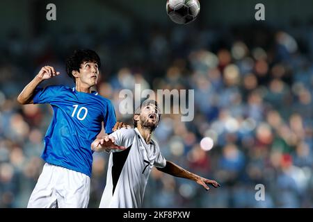 Joueurs de football dans le stade Banque D'Images