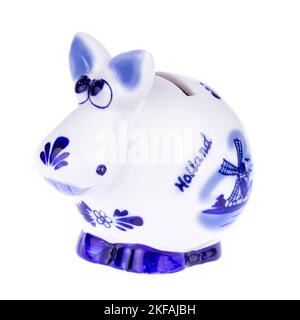 Tirelire en forme de vache avec ornement bleu Banque D'Images