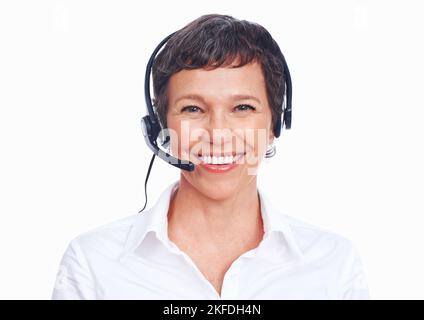 Service avec le sourire. Gros plan portrait d'une femme mature représentant du service clientèle souriant - espace d'imitation. Banque D'Images