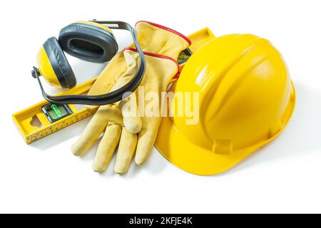 construction outils de travail casque gants écouteurs de niveau isolés sur fond blanc Banque D'Images