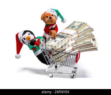 Les aides du Père Noël avec un panier plein d'argent. Concept de Noël amusant Banque D'Images