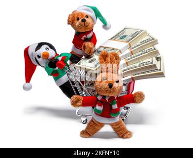 Les aides du Père Noël avec un panier plein d'argent. Concept de Noël amusant Banque D'Images