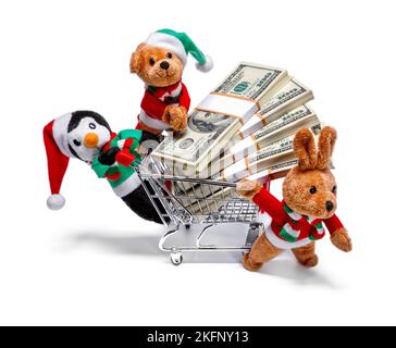 Les aides du Père Noël avec un panier plein d'argent. Concept de Noël amusant Banque D'Images